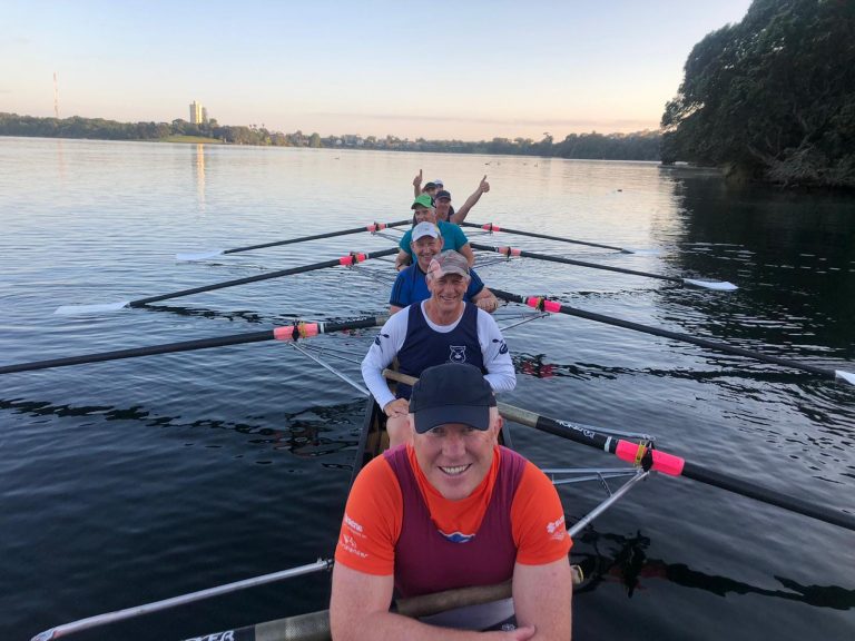 Men rowing on lake Pupuke Auckland