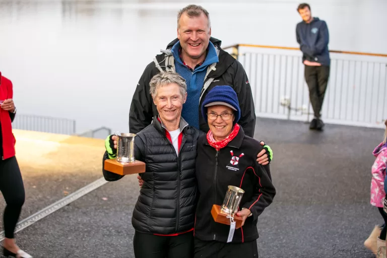 Mahe Drysdale presents prizes to two ladies at NZ Legion Masters Rowing Regatta